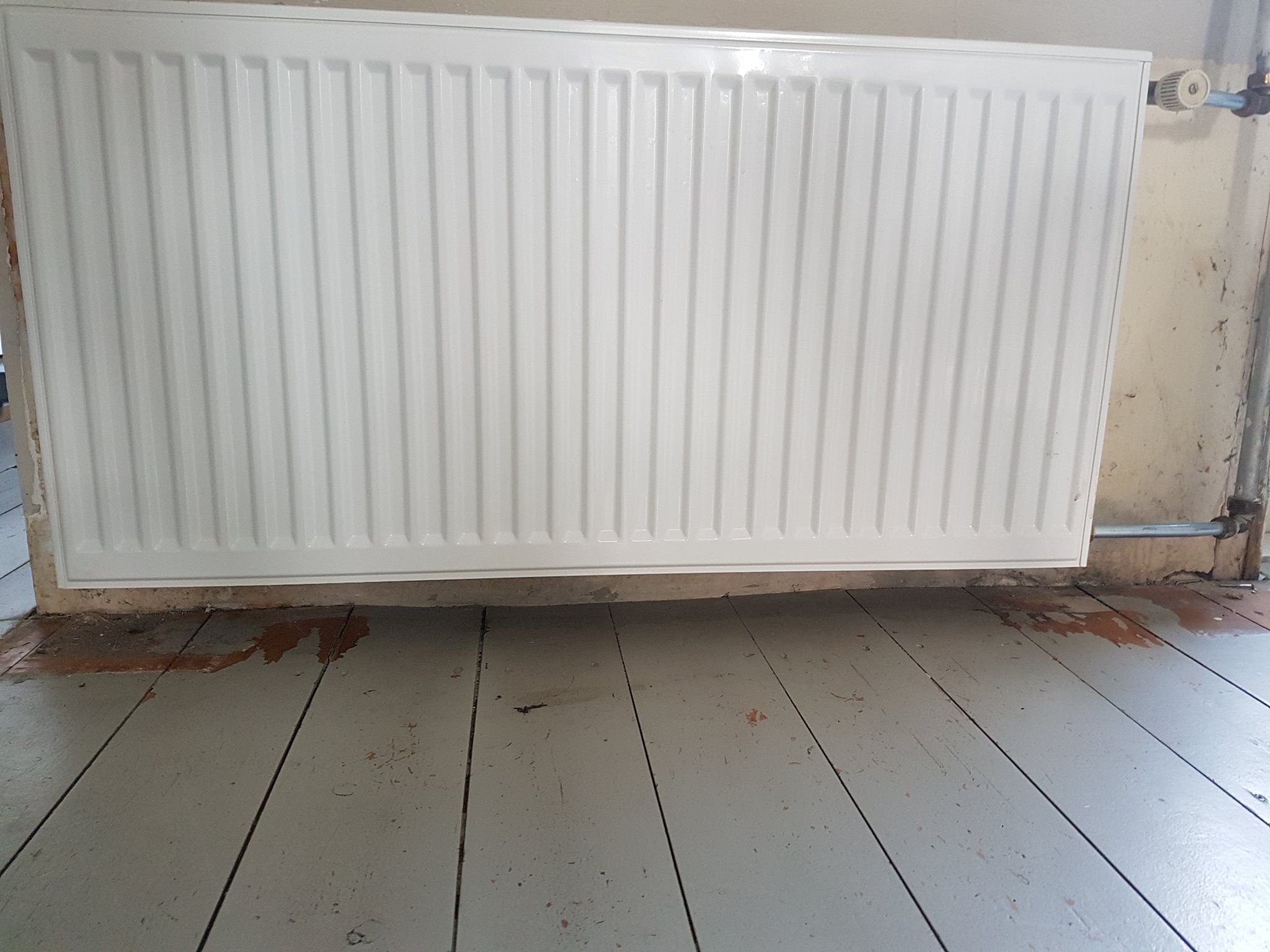 Vervangen houten vloer &amp; plaatsen ombouw radiator Werkspot