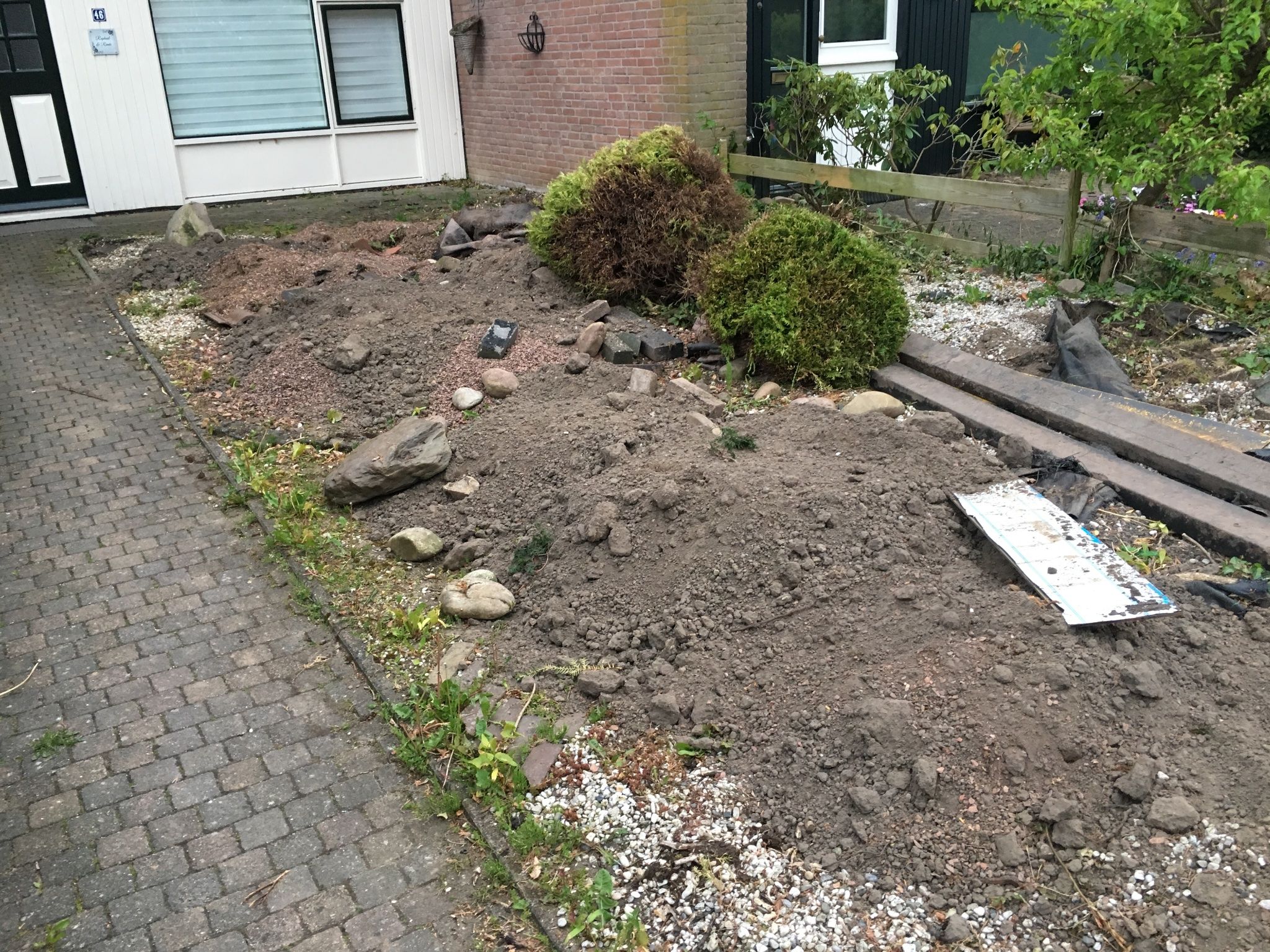 Tuin uitgraven + puin afvoeren en zand storten Werkspot