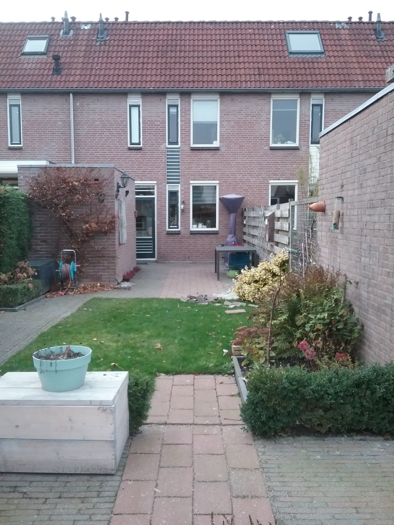 Tuin betegelen Werkspot