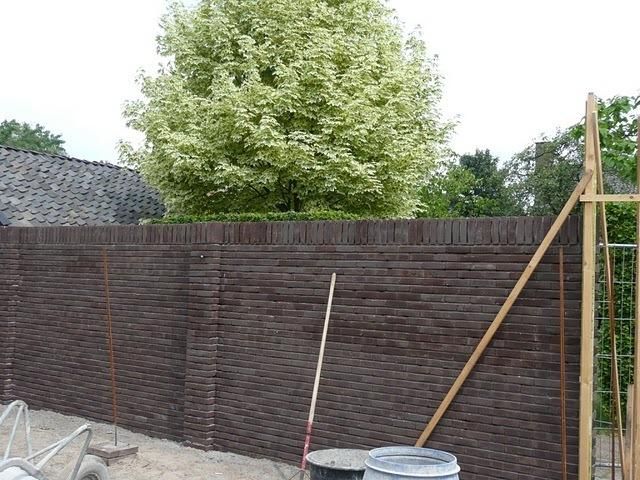 Constructie tuinmuur met penanten (poeren) Werkspot