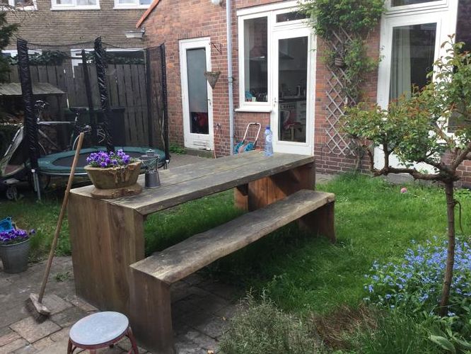 tuin opnieuw indelen en betegelen Werkspot