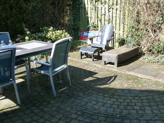 Patio tuin herbestraten Werkspot