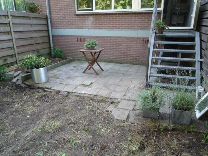 Kleine tuin bestraten + schutting plaatsen Werkspot