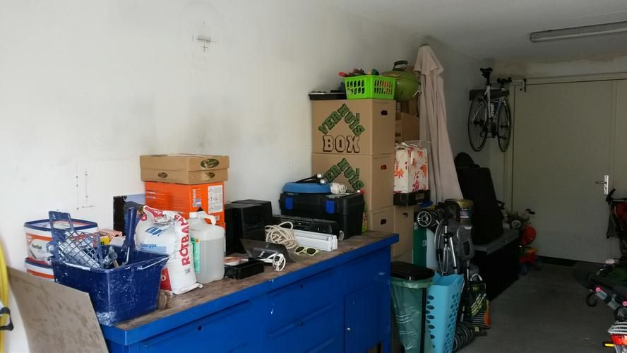 Garage muren aansmeren en sauzen, evenals garagevloer coaten