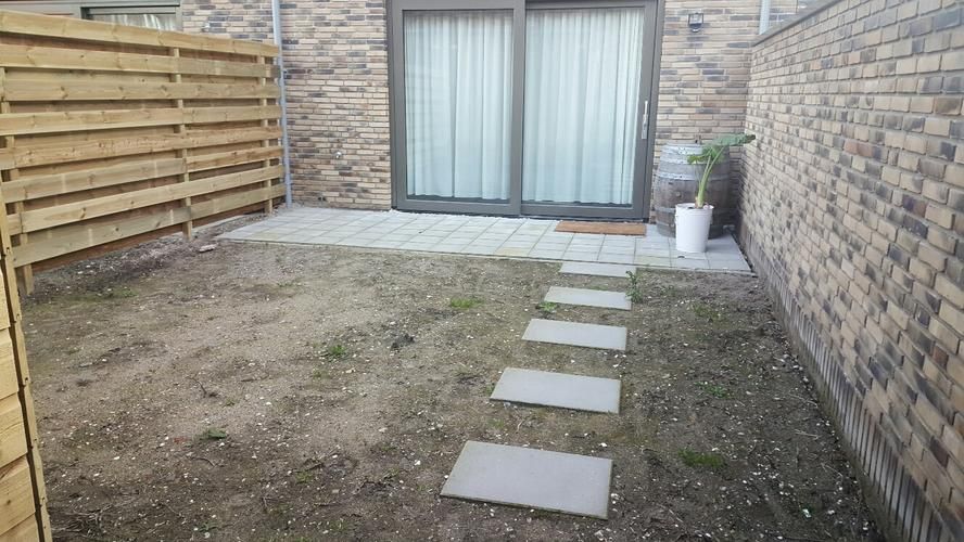 Aanleggen tuin gras tegels 60 m2 Werkspot