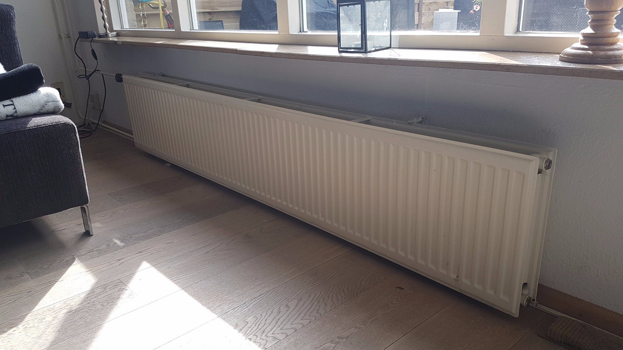 Vervangen radiator woonkamer Werkspot