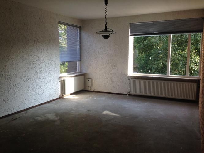 Schuren en stucen van muren appartement Werkspot