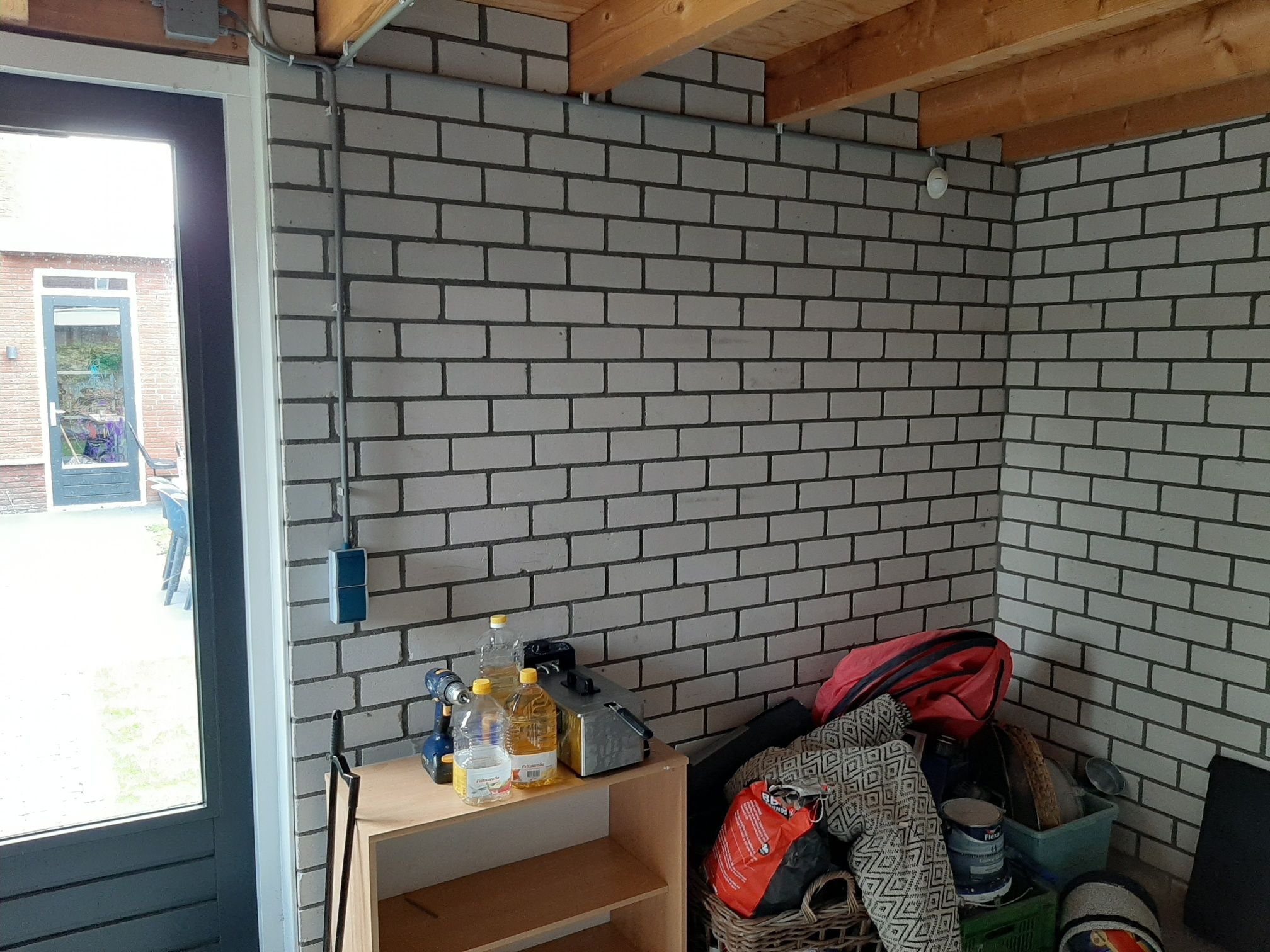 Garage 15 m2; Uitsparing maken in blinde Steens muur. Werkspot