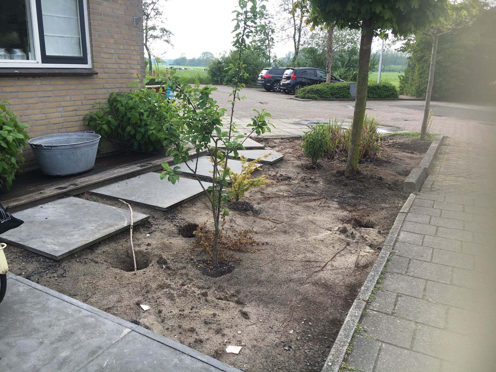 Uitgraven En Afvoeren Witzand Tuin En Opvullen Met Tuinaarde Werkspot