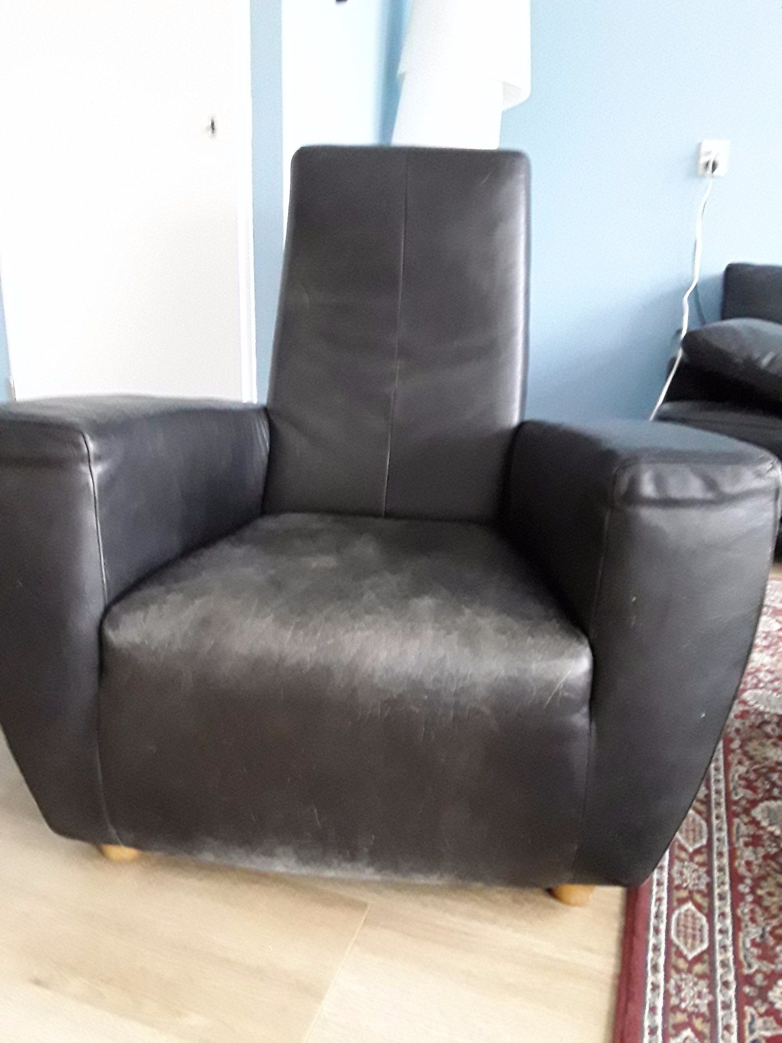 Fauteuil leer stofferen Longa van Gerard van de Berg Werkspot