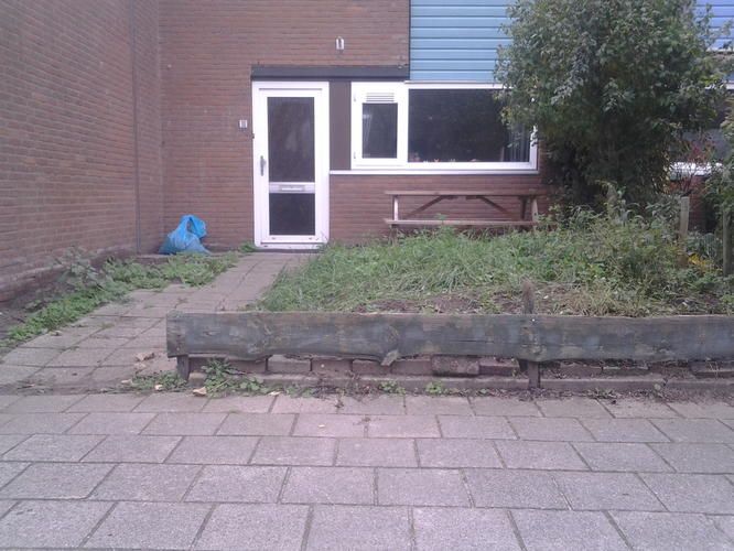 tuin afgraven, leeghalen en betegelen Werkspot