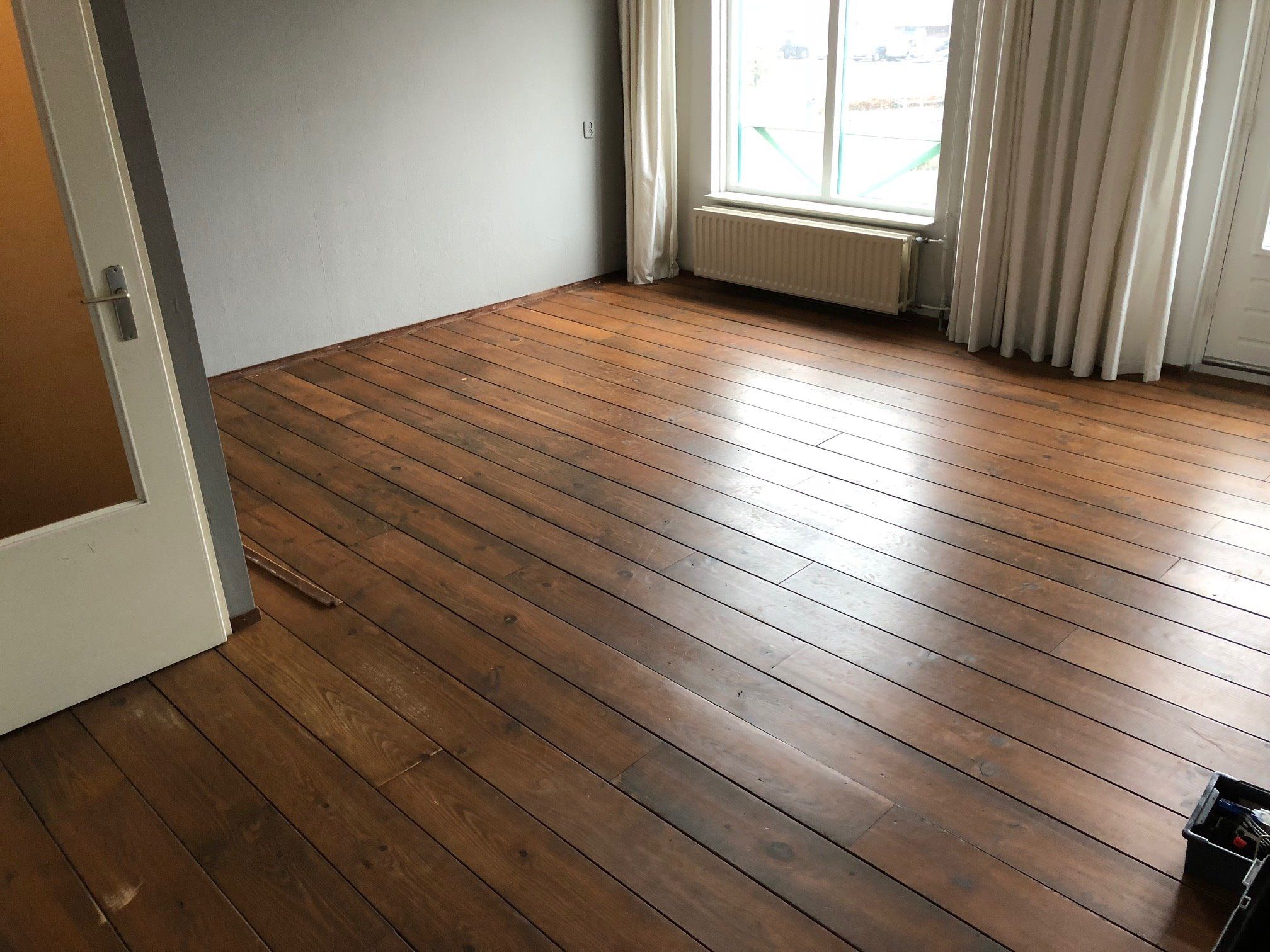 Houten vloer schuren Woonkamer/Keuken/Hal 45m2 Werkspot