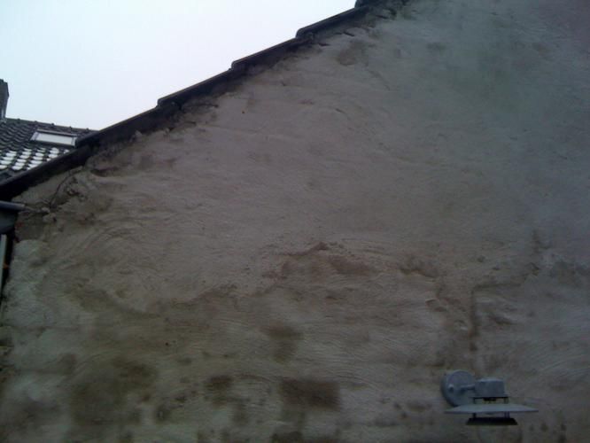 Aansmeren muur met cement i.v.m. impregneren buitenmuur Werkspot