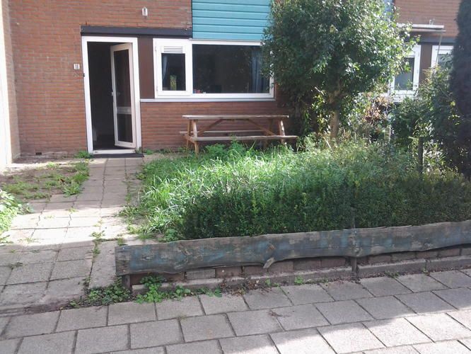 tuin afgraven en betegelen Werkspot